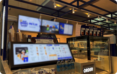 Regional coffee chain rollout of commercial displays and stretch menu signage